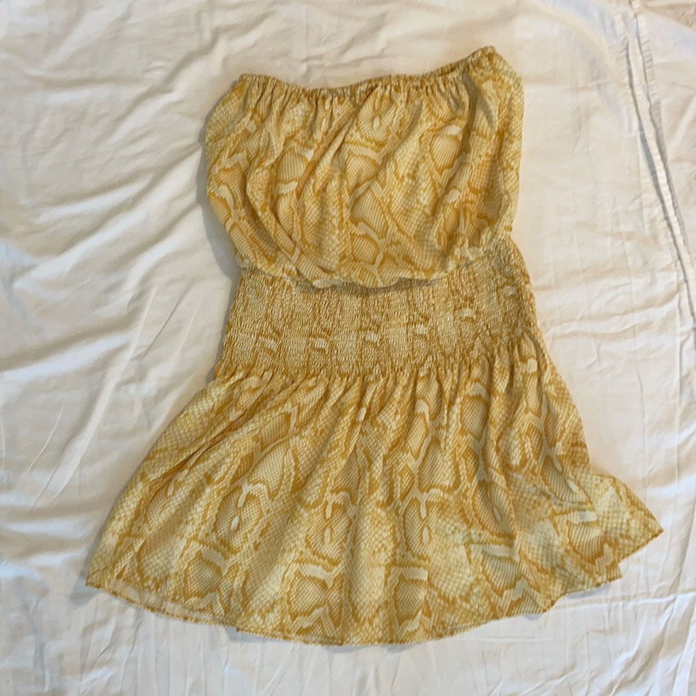 Yellow snack print strapless mini dress